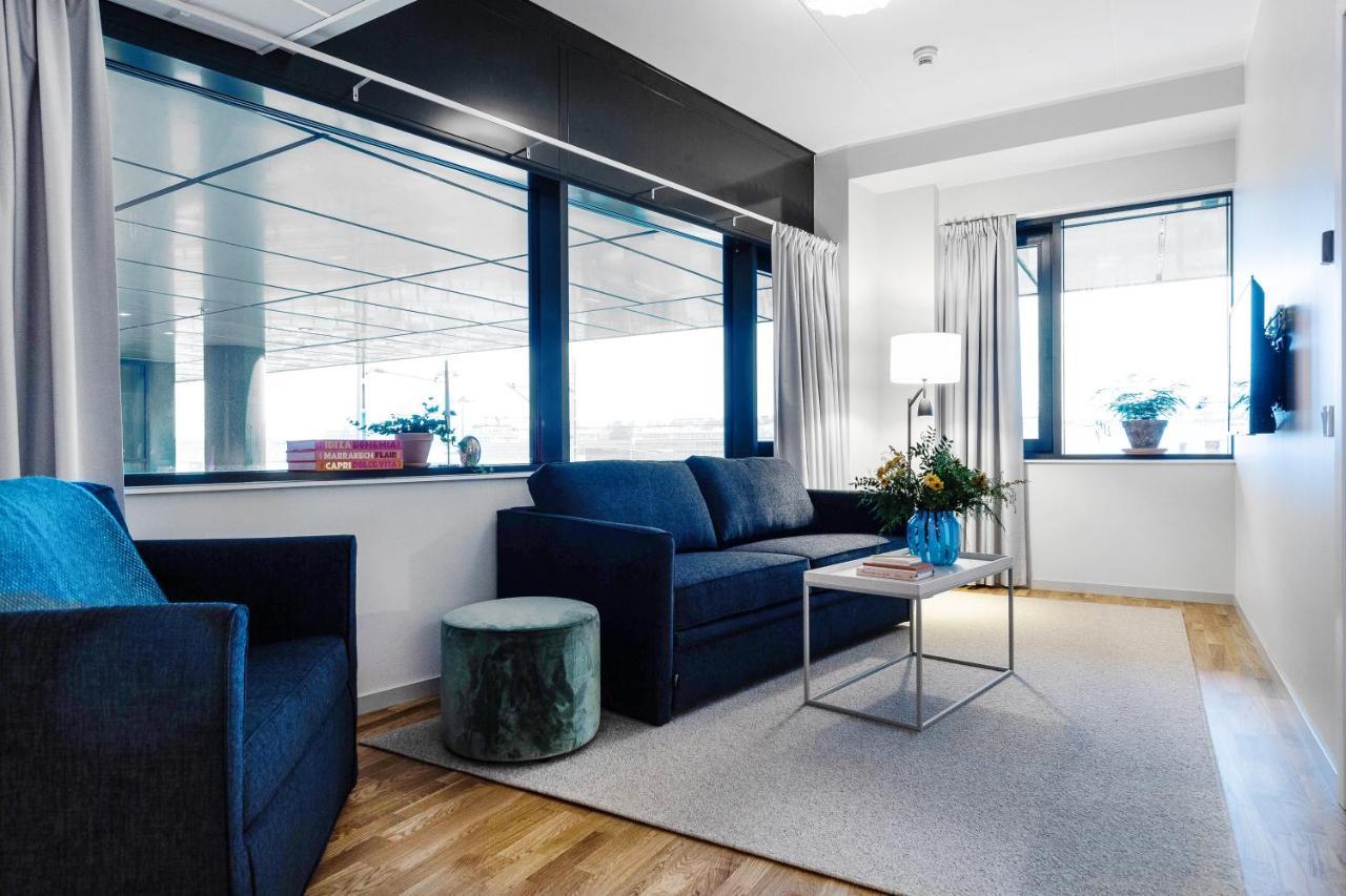Biz Apartment Bromma Stockholm Eksteriør billede A living room in a serviced apartment